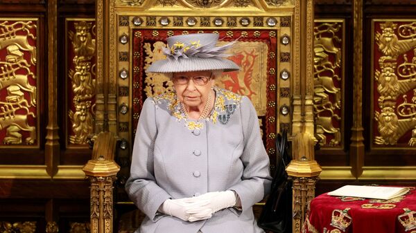 Britain's Queen Elizabeth sits ahead of the Queen's Speech in the House of Lord's Chamber during the State Opening of Parliament in London, Britain, 11 May 2021 - Sputnik International