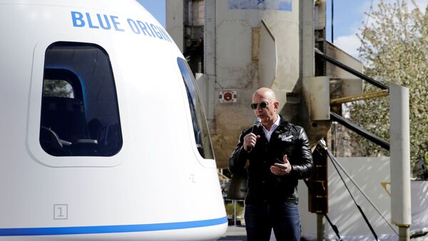  Amazon and Blue Origin founder Jeff Bezos addresses the media about the New Shepard rocket booster and Crew Capsule mockup at the 33rd Space Symposium in Colorado Springs, Colorado, United States April 5, 2017 - Sputnik International