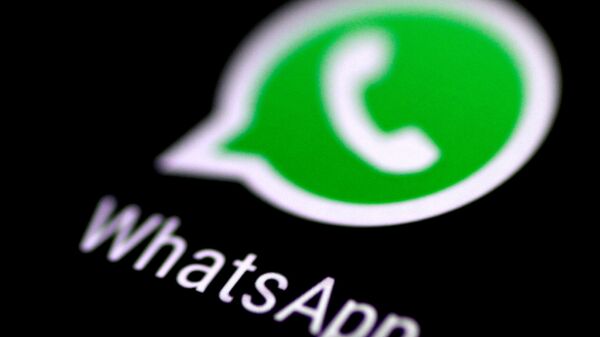 FILE PHOTO: The WhatsApp messaging application is seen on a phone screen - Sputnik International