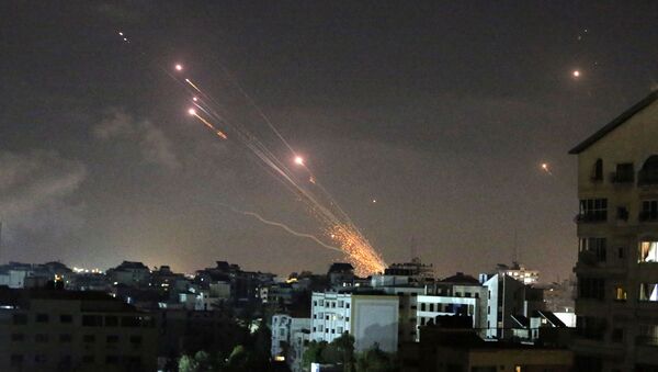 Rockets are launched by Palestinian militants into Israel, in Gaza May 12, 2021. - Sputnik International