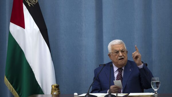 Palestinian President Mahmoud Abbas speaks a meeting of the PLO executive committee and a Fatah Central Committee at the Palestinian Authority headquarters, in the West Bank city of Ramallah, Wednesday, May 12, 2021. - Sputnik International