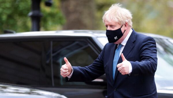 Britain's Prime Minister Boris Johnson makes a 'thumbs-up' gesture as he arrives at the G7 foreign ministers meeting in London on May 5, 2021 - Sputnik International