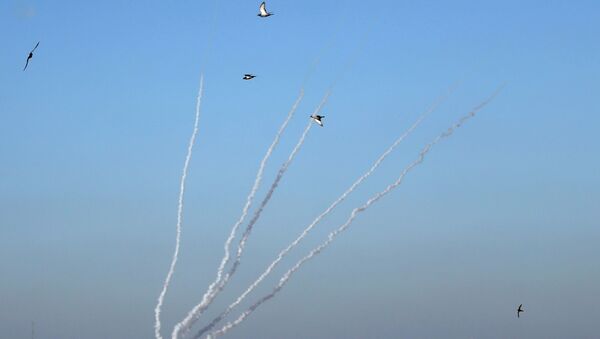 Rockets are launched by Palestinian militants into Israel, in Gaza May 13, 2021. - Sputnik International