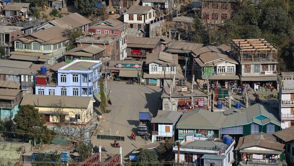 Residential houses on the Myanmar's side are seen at Zokhawthar in the India's northeastern state of Mizoram on March 15, 2021 - Sputnik International