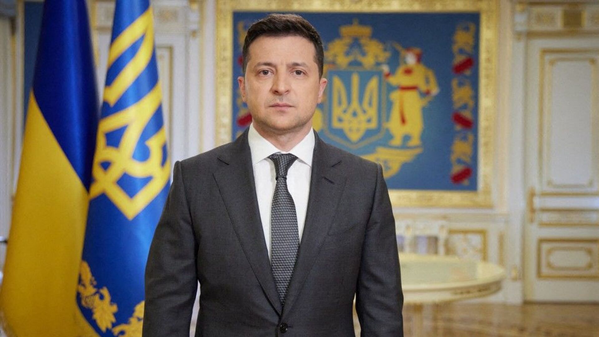 This handout photograph taken and released by The Ukrainian Presidential Press Service on April 20, 2021, shows Ukranian President Volodymyr Zelensky speaking during his late evening address in Kiev.  - Sputnik International, 1920, 08.03.2022
