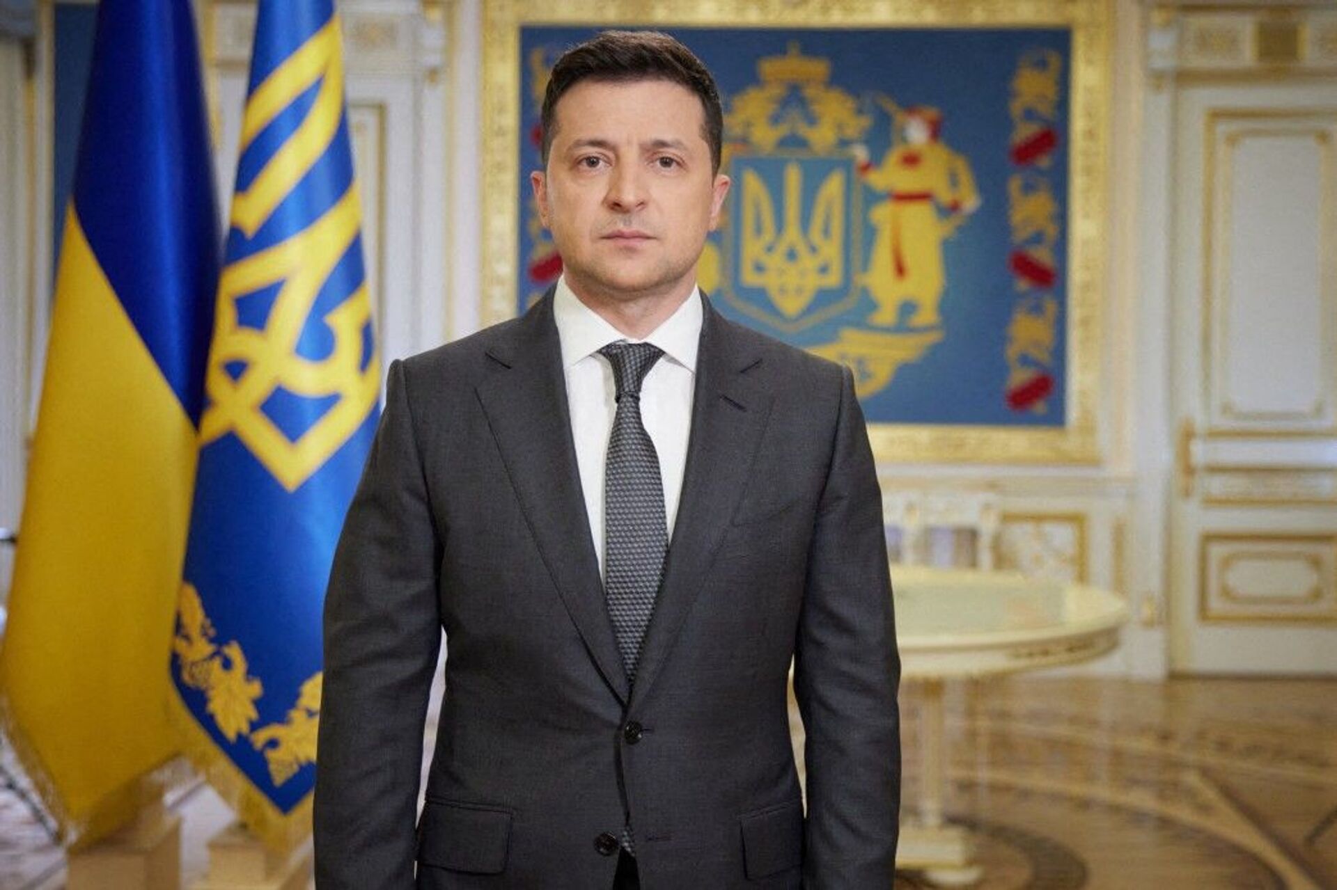 This handout photograph taken and released by The Ukrainian Presidential Press Service on April 20, 2021, shows Ukranian President Volodymyr Zelensky speaking during his late evening address in Kiev.  - Sputnik International, 1920, 16.03.2022