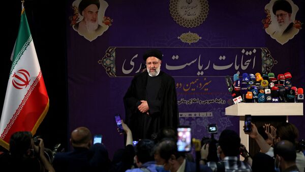 Iranian judiciary chief Ebrahim Raisi arrives to deliver a speech after registering his candidacy for Iran's presidential elections, at the Interior Ministry in capital Tehran, on May 15, 2021, ahead of the presidential elections scheduled for June.  - Sputnik International