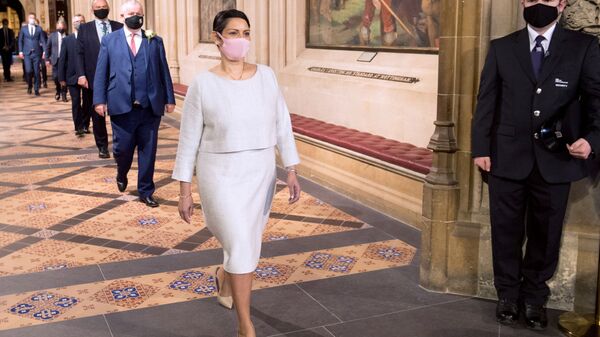 British Home Secretary Priti Patel processes through the Central Lobby from House of Lords after the Queen's Speech during the State Opening of Parliament in London, Britain May 11, 2021. - Sputnik International