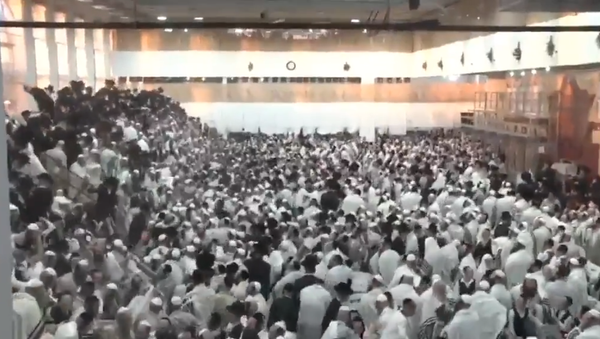 Screengrab of footage showing collapse of bleachers at a West Bank synagogue. - Sputnik International