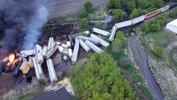 Fire is seen on a Union Pacific train carrying hazardous material that has derailed in Sibley, Iowa, US, in this still frame obtained from social media drone video dated 16 May 2021. - Sputnik International