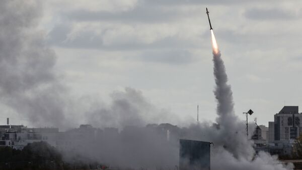 Israel's Iron Dome anti-missile system fires to intercept a rocket launched from the Gaza Strip towards Israel, as seen from Ashdod, Israel May 17, 2021 - Sputnik International