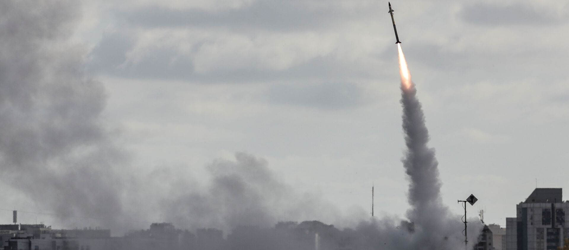 Israel's Iron Dome anti-missile system fires to intercept a rocket launched from the Gaza Strip towards Israel, as seen from Ashdod, Israel May 17, 2021 - Sputnik International, 1920