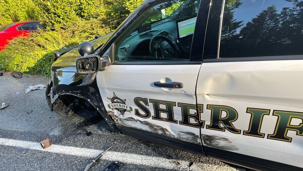 On Saturday, a deputy responded to a collision in the 25200 block of 103rd Ave NE where a vehicle sheared a power pole in half. The deputy parked on the shoulder on the road, with his emergency lights flashing, and exited his vehicle to speak with the Fire units on scene. Approximately 30 seconds later, a Tesla in “autopilot” mode, struck the deputy's vehicle causing significant damage. Thankfully, there were no injuries from this collision. This is a great reminder that vehicles may have autopilot to assist, but it cannot be relied upon to get you safely from one destination to the next. - Sputnik International