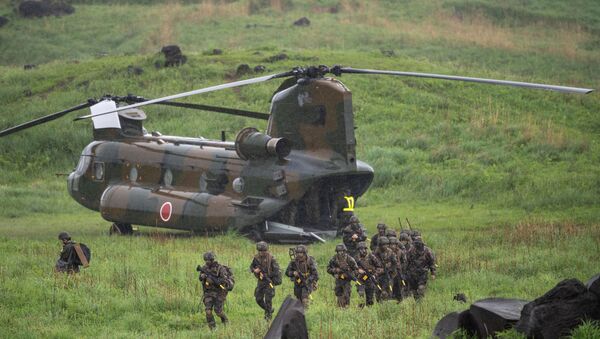 French soldiers walk from a Chinook helicopter during a joint military drill between Japan Self-Defense Forces, French Army and U.S. Marines, at the Kirishima exercise area in Ebino, Miyazaki prefecture, Japan May 15, 2021 - Sputnik International