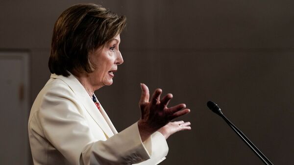U.S. House Speaker Nancy Pelosi (D-CA) gestures, as she holds her weekly news conference with Capitol Hill reporters in Washington, D.C., U.S. May 20, 2021. - Sputnik International