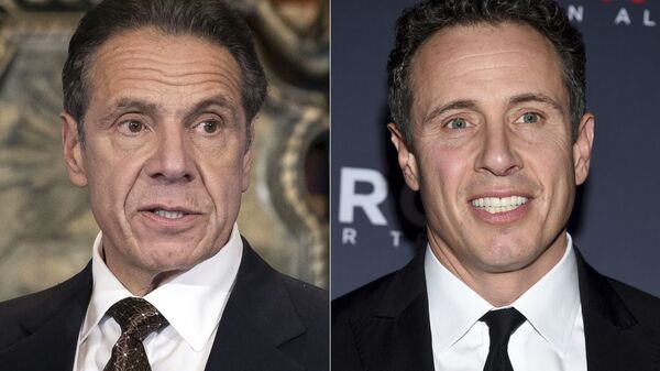 New York Gov. Andrew M. Cuomo appears during a news conference about the COVID-19at the State Capitol in Albany, N.Y., on Dec. 3, 2020, left, and CNN anchor Chris Cuomo attends the 12th annual CNN Heroes: An All-Star Tribute at the American Museum of Natural History in New York on Dec. 9, 2018. CNN said Thursday, May 20, 2021 it was “inappropriate” for anchor Chris Cuomo to have been involved in phone calls with the staff of his brother, New York Gov. Andrew Cuomo, where strategies on how the governor should respond to sexual harassment allegations were allegedly discussed. - Sputnik International