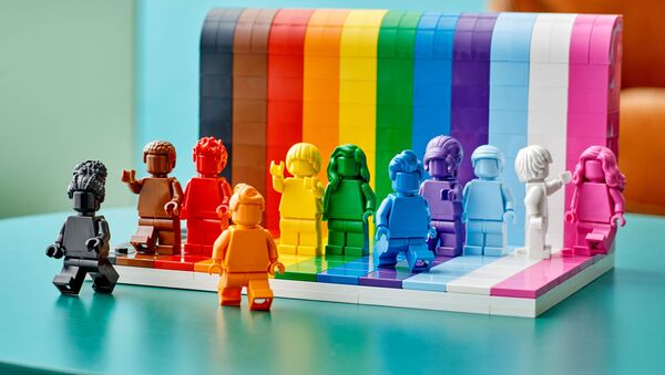 Figures developed from the colors of the rainbow flag are seen in a photograph released May 20, 2021 for the launch of the new LEGO Everyone is Awesome set. - Sputnik International