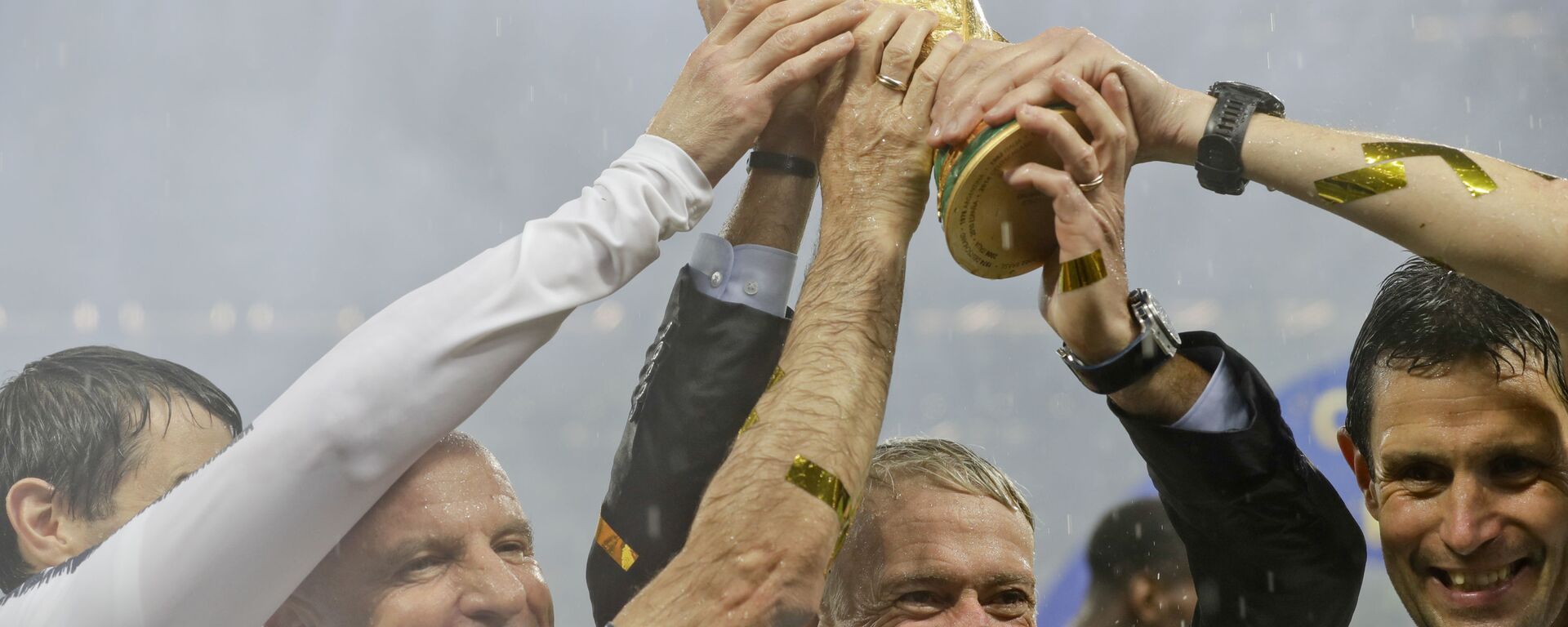 France head coach Didier Deschamps holds the World Cup after defeating Croatia in the 2018 final in Moscow. - Sputnik International, 1920, 24.11.2021
