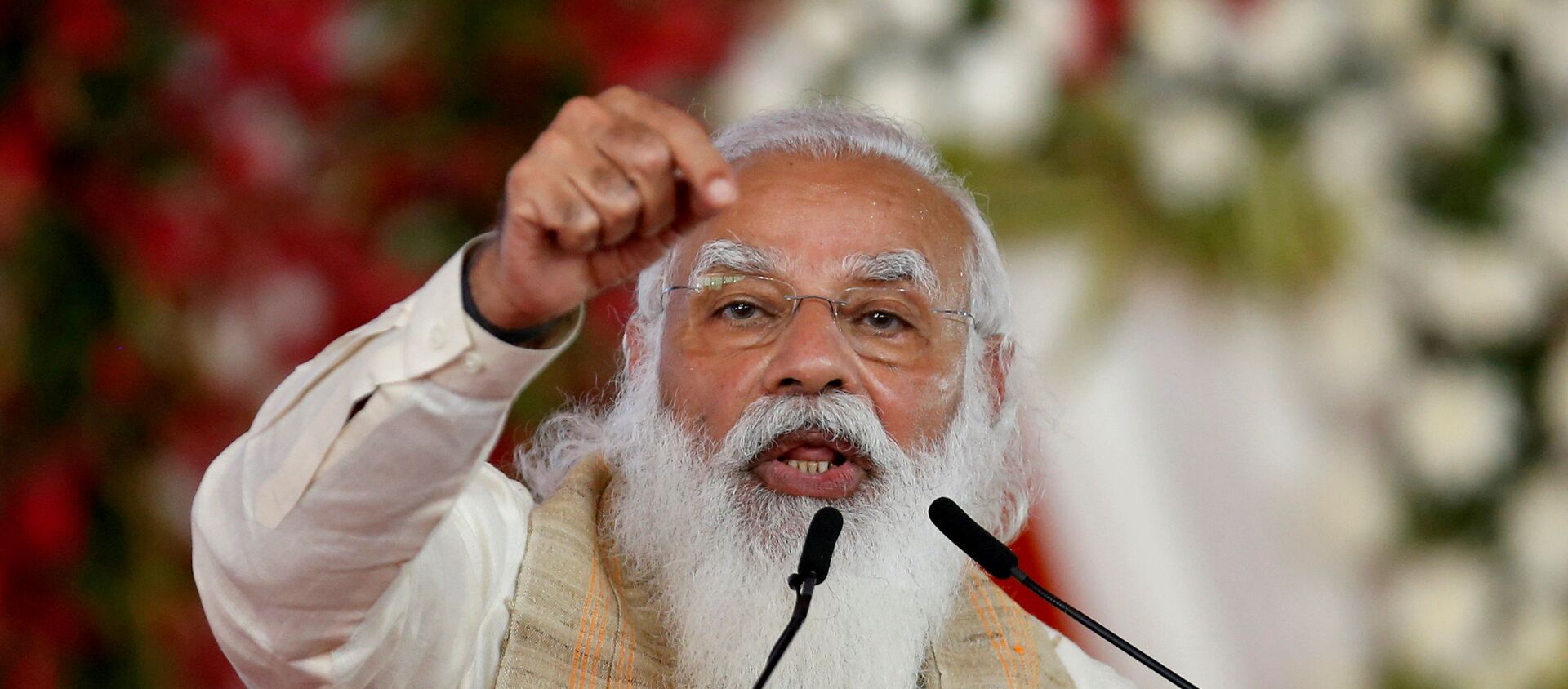 FILE PHOTO: India's Prime Minister Narendra Modi addresses a gathering before flagging off the Dandi March, or Salt March, to celebrate the 75th anniversary of India's Independence, in Ahmedabad, India, March 12, 2021. - Sputnik International, 1920, 21.05.2021