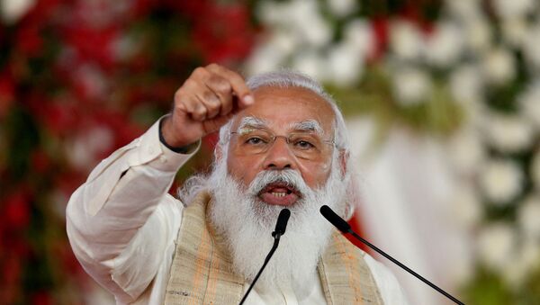 FILE PHOTO: India's Prime Minister Narendra Modi addresses a gathering before flagging off the Dandi March, or Salt March, to celebrate the 75th anniversary of India's Independence, in Ahmedabad, India, March 12, 2021. - Sputnik International