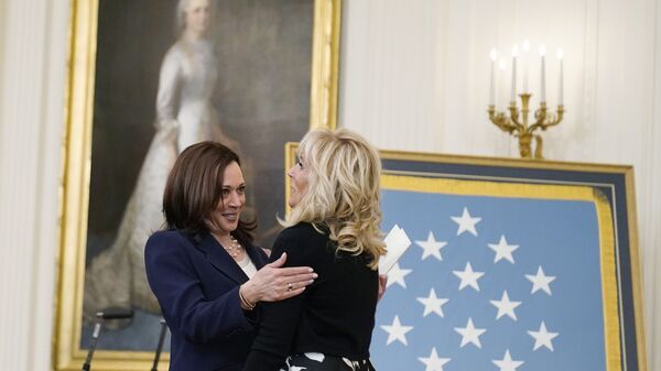 First lady Jill Biden is greeted by Vice President Kamala Harris before a Medal of Honor ceremony for retired U.S. Army Col. Ralph Puckett, in the East Room of the White House, Friday, May 21, 2021 - Sputnik International