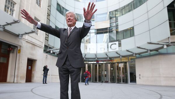 Tony Hall poses for photographers on his arrival at Broadcasting House for his first day as the new Director General of the BBC, in central London April 2, 2013. - Sputnik International