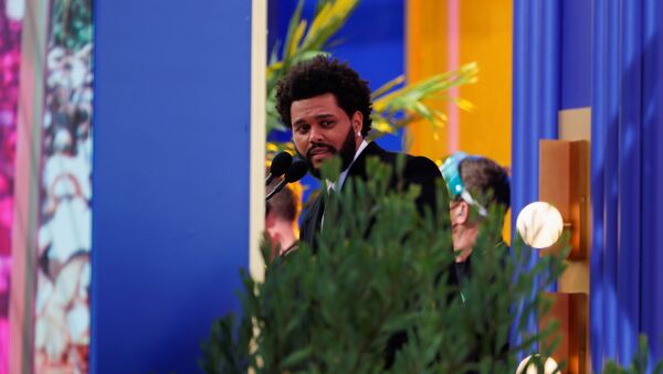 The Weeknd speaks after he won the award for Top Hot 100 Artist at the 2021 Billboard Music Awards outside the Microsoft Theater in Los Angeles, California, U.S. May 23, 2021 - Sputnik International