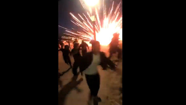 Screenshot from a video allegedly filmed at a massive viral party dubbed Adrian's Kickback in Huntington Beach, California - Sputnik International