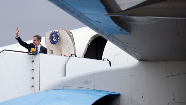 US Secretary of State Antony Blinken boards his airplane prior to departing from Keflavik Air Base in Keflavik, Iceland, May 20, 2021. - Sputnik International