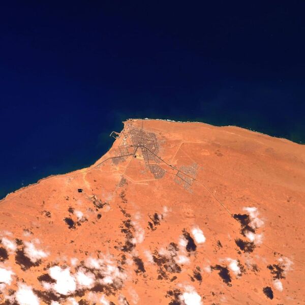 Порт в Западной Сахаре на фотографии астронавта ЕКА Томаса Песке - Sputnik International