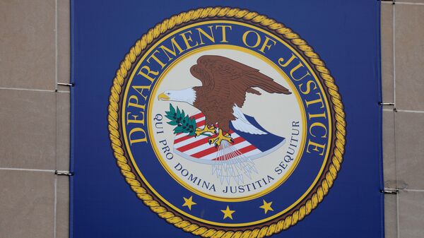 The crest of the United States Department of Justice (DOJ) is seen at their headquarters in Washington, D.C., U.S., May 10, 2021.  - Sputnik International