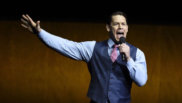 John Cena, a cast member in the upcoming film Playing with Fire, addresses the audience during the Paramount Pictures presentation at CinemaCon 2019, the official convention of the National Association of Theatre Owners (NATO) at Caesars Palace, Thursday, April 4, 2019, in Las Vegas. - Sputnik International