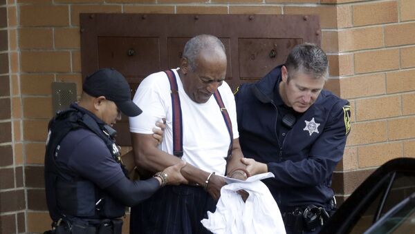 Bill Cosby is escorted out of the Montgomery County Correctional Facility, Tuesday Sept. 25, 2018, in Eagleville, Pa., following his sentencing to three-to-10-year prison sentence for sexual assault.  - Sputnik International