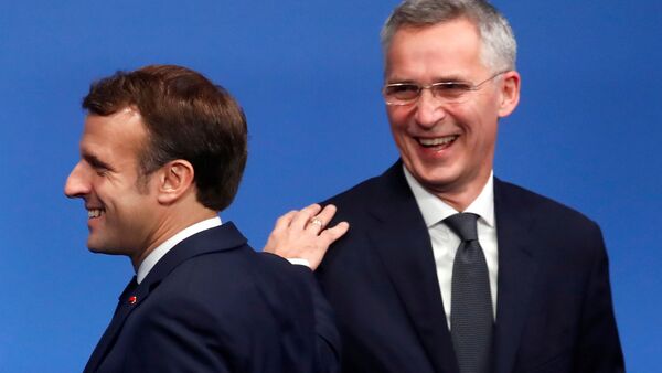 FILE PHOTO: French President Emmanuel Macron and NATO Secretary General Jens Stoltenberg react at a NATO summit meeting n Watford, Britain December 4, 2019. REUTERS/Christian Hartmann/Pool/File Photo - Sputnik International