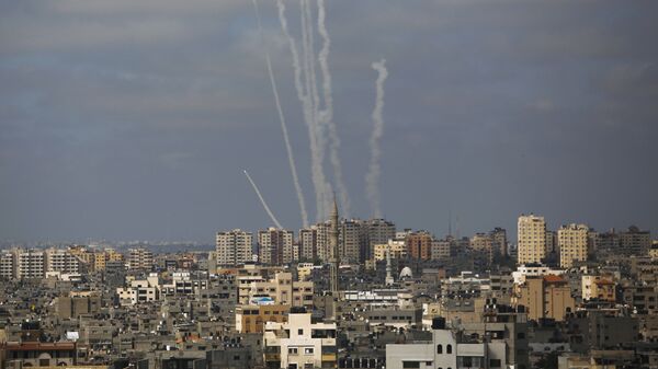 Rockets are launched from the Gaza Strip towards Israel, in Gaza City, Thursday, May 20, 2021. - Sputnik International