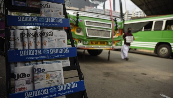 Indian newspapers are displayed for sale outside a shop at a bus terminus which has been shut down for more than a month as part of measures to curb the spread of the COVID-19 pandemic in Kochi, Kerala state, India, Wednesday, April 29, 2020 - Sputnik International