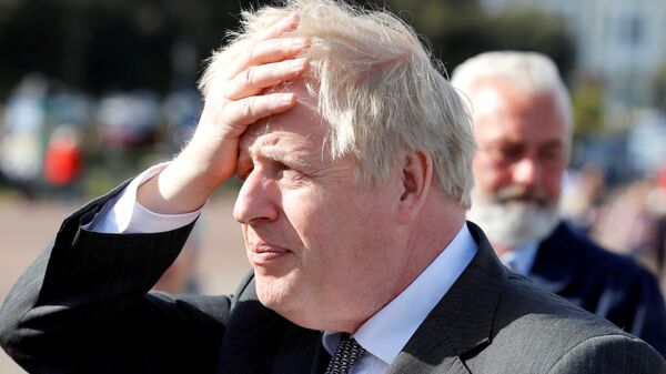 Britain's Prime Minister Boris Johnson visits Llandudno, Wales, Britain, April 26, 2021 - Sputnik International
