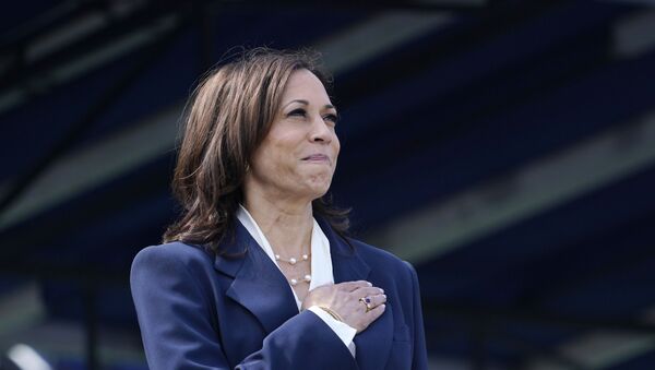 Vice President Kamala Harris stands during the National Anthem at the graduation and commissioning ceremony at the U.S. Naval Academy in Annapolis, Md., Friday, May 28, 2021 - Sputnik International