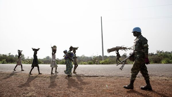 Rwandan MINUSCA peacekeeping forces patrol outside Bangui, Central African Republic, Saturday Jan. 23, 2021.  - Sputnik International