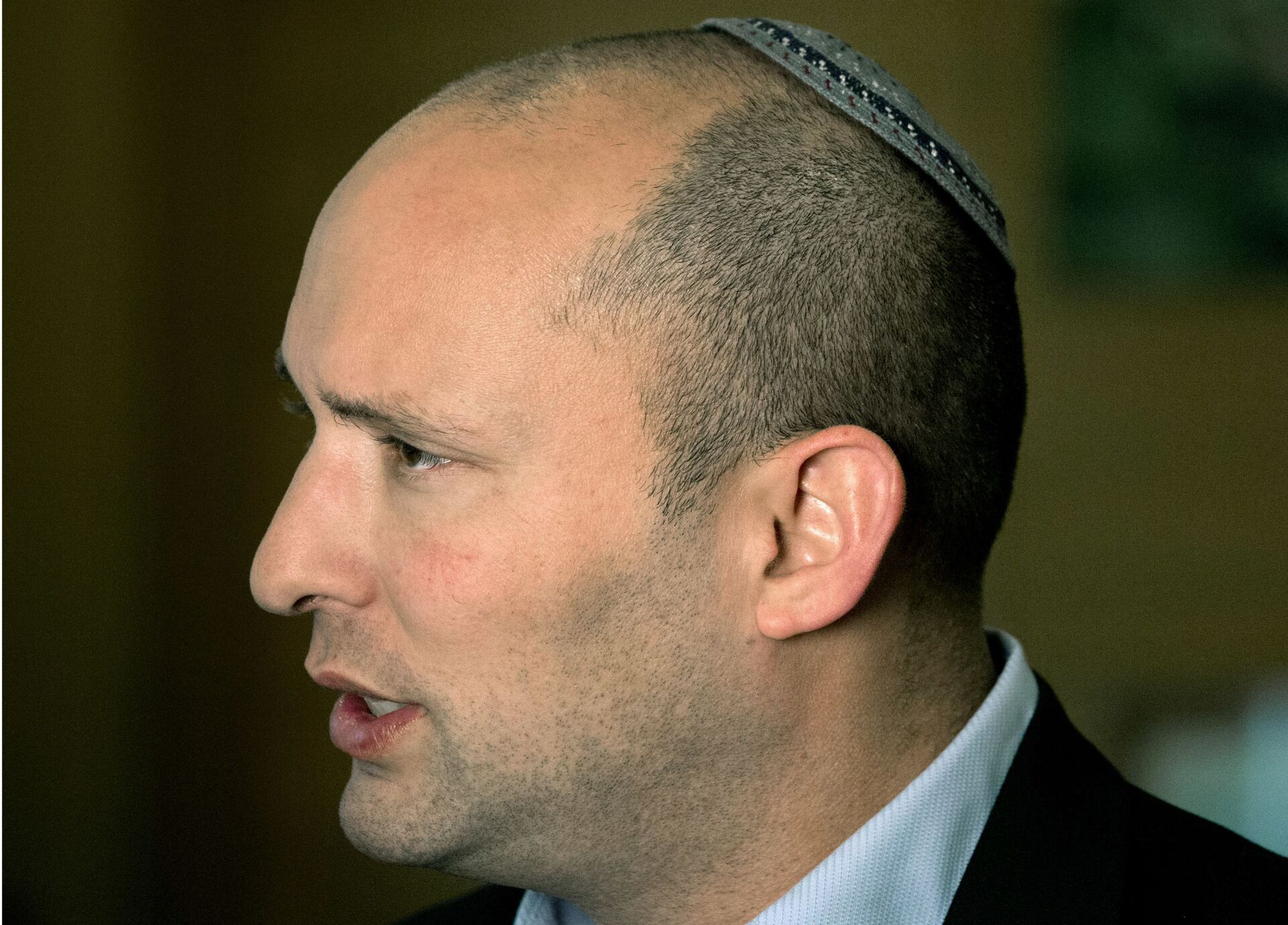  In this Monday, Feb. 16, 2015 file photo, Naftali Bennett, leader of the Jewish Home party, speaks during an interview to The Associated Press in Jerusalem. - Sputnik International, 1920, 07.09.2021