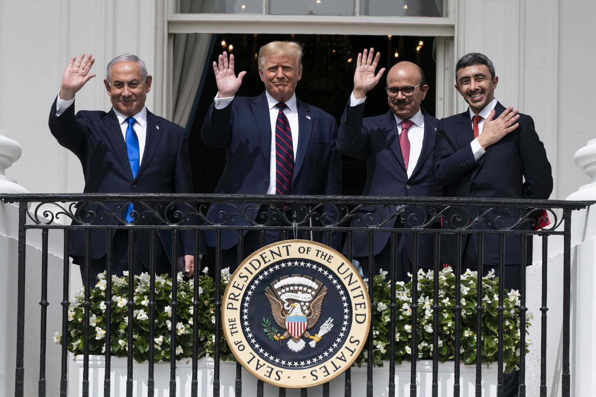 In this Tuesday, Sept. 15, 2020 file photo, Israeli Prime Minister Benjamin Netanyahu, left, U.S. President Donald Trump, Bahrain Foreign Minister Khalid bin Ahmed Al Khalifa and United Arab Emirates Foreign Minister Abdullah bin Zayed al-Nahyan pose for a photo on the Blue Room Balcony after signing the Abraham Accords during a ceremony on the South Lawn of the White House in Washington. - Sputnik International, 1920, 07.10.2021