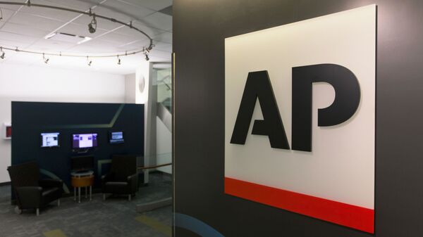 FILE - The Associated Press logo appears on April 26, 2016, in New York - Sputnik International