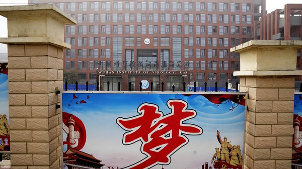 The Wuhan Institute of Virology is seen near the Chinese character for Dream during a visit by the World Health Organization team in Wuhan, China, Wednesday, Feb. 3, 2021 - Sputnik International