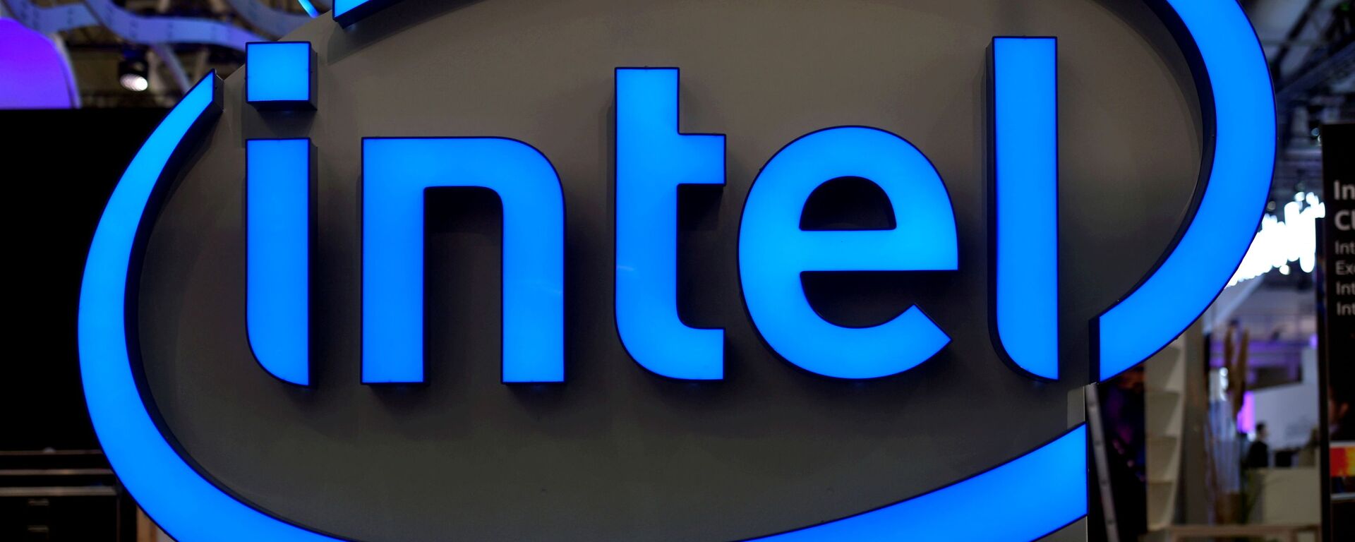 Intel's logo is pictured during preparations at the CeBit computer fair, which will open its doors to the public on March 20, at the fairground in Hanover, Germany, March 19, 2017 - Sputnik International, 1920, 01.06.2021