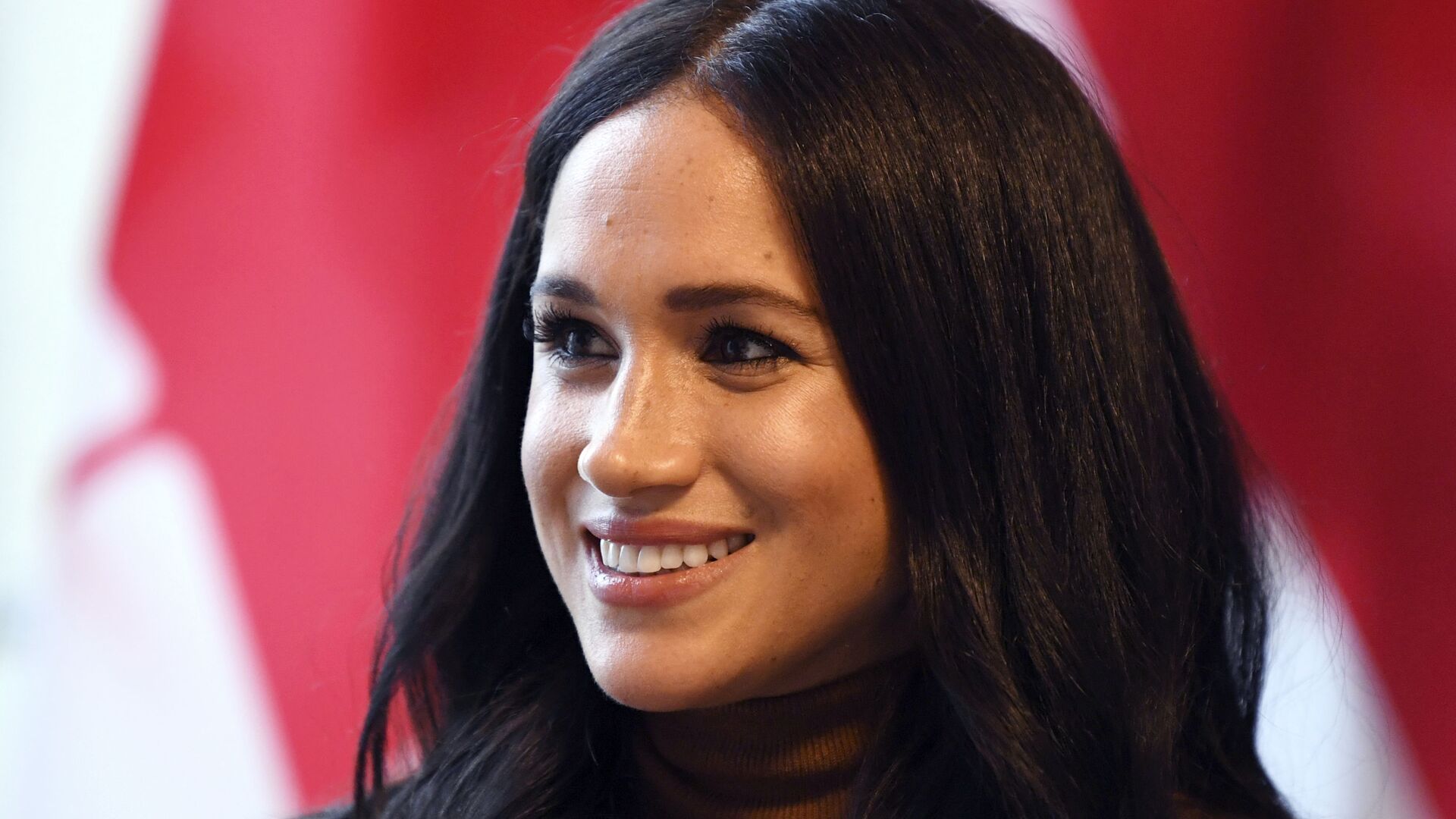 In this Tuesday, Jan. 7, 2020 file photo, Meghan, Duchess of Sussex smiles during her visit with Prince Harry to Canada House, in London - Sputnik International, 1920, 10.05.2022