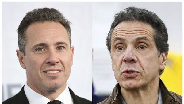 This combination photo shows CNN news anchor Chris Cuomo at the WarnerMedia Upfront in New York on May 15, 2019, left, and New York Gov. Andrew Cuomo speaking during a news conference in New York on March 23, 2020 - Sputnik International