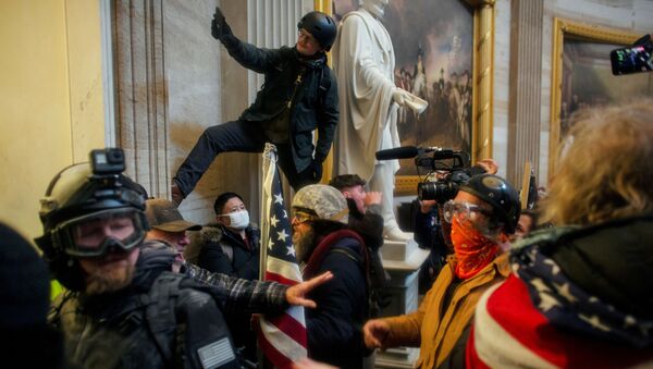 FILE PHOTO: Pro-Trump protesters storm the U.S. Capitol to contest the certification of the 2020 U.S. presidential election results by the U.S. Congress, at the U.S. Capitol Building in Washington, DC., 6 January 2021.  - Sputnik International