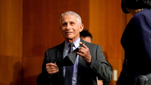 Dr. Anthony Fauci, director of the National Institute of Allergy and Infectious Diseases, arrives for a Senate Health, Education, Labor and Pensions Committee hearing to discuss the on-going federal response to COVID-19, at the U.S. Capitol in Washington, DC, 11 May 2021 - Sputnik International