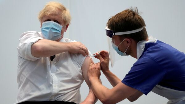 Britain's Prime Minister Johnson receives his second dose of the AstraZeneca coronavirus disease (COVID-19) vaccine, in London - Sputnik International
