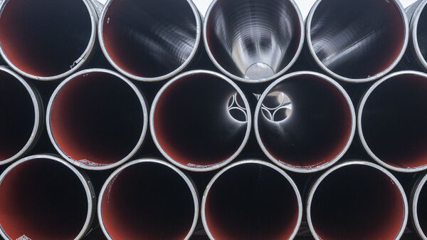 Pipes for the Baltic Pipe gas pipeline are stacked at Houstrup Strand, near Noerre Nebel, Jutland, Denmark, on February 23, 2021 - Sputnik International